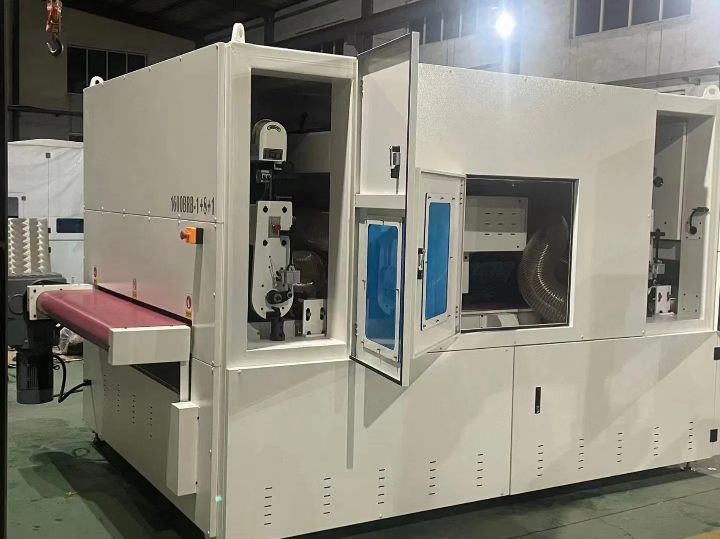 Skilled technicians overseeing cold welding machine production